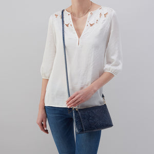 Darcy + Eliza Small Zip Around Crossbody + Card Case In Polished Leather and Polished Damask Deboss - Denim