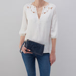 Darcy + Eliza Small Zip Around Crossbody + Card Case In Polished Leather and Polished Damask Deboss - Denim